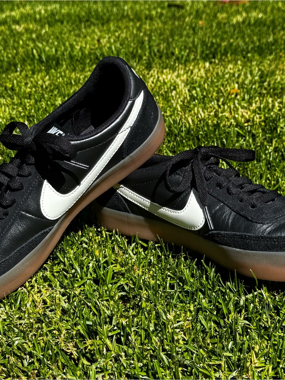 Nike Women's Black Leather Low-Top Sneakers with White Swoosh